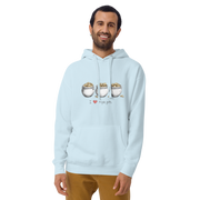 Man wearing light blue hoodie with 'I ❤️ triple pots' graphic, featuring three pots of gold coins, perfect for slot machine fans.