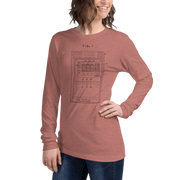 Woman wearing dusty rose long-sleeve tee with vintage slot machine patent diagram, FIG. 1, for casino lovers