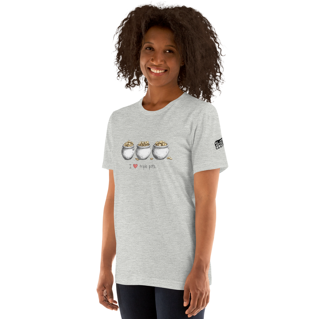 Woman wearing gray t-shirt with 'I ❤️ triple pots' graphic featuring three pots of gold, slot-themed apparel