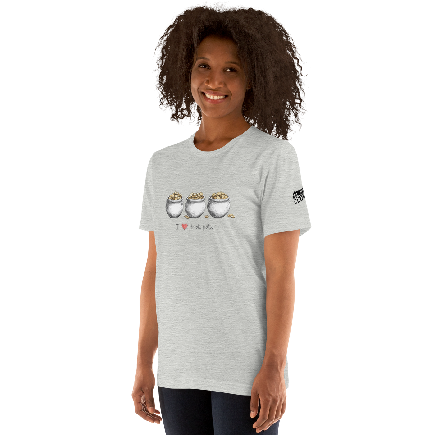 Woman wearing gray t-shirt with 'I ❤️ triple pots' graphic featuring three pots of gold, slot-themed apparel