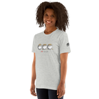 Woman wearing gray t-shirt with 'I ❤️ triple pots' graphic featuring three pots of gold, slot-themed apparel