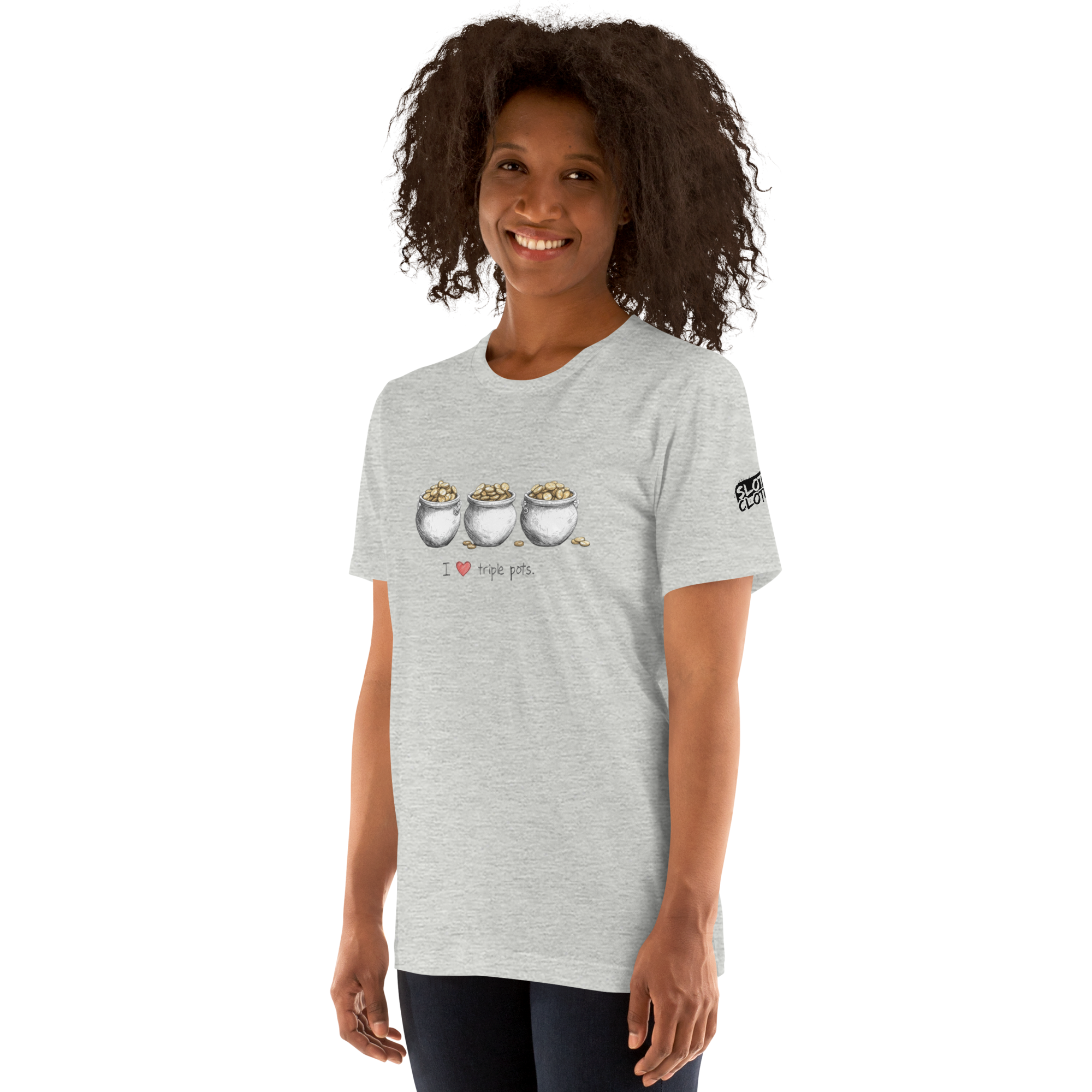 Woman wearing gray t-shirt with 'I ❤️ triple pots' graphic featuring three pots of gold, slot-themed apparel