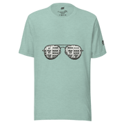 Mint green t-shirt with slot machine sunglasses graphic, featuring 7s and BAR symbols for casino-themed fashion.