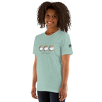 Woman wearing mint green t-shirt with 'I ❤️ triple pots' graphic and three pots of gold, slot-themed apparel