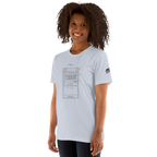 Woman wearing light blue t-shirt with slot machine patent diagram graphic, quirky casino-themed apparel