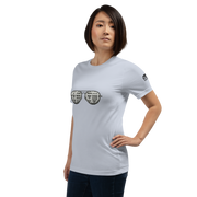 Woman wearing light gray t-shirt with slot machine sunglasses graphic, ideal for casino lovers and gaming fans.