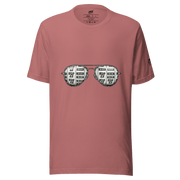 Pink t-shirt with slot machine sunglasses graphic, featuring 7s and BAR symbols for casino-themed fashion.