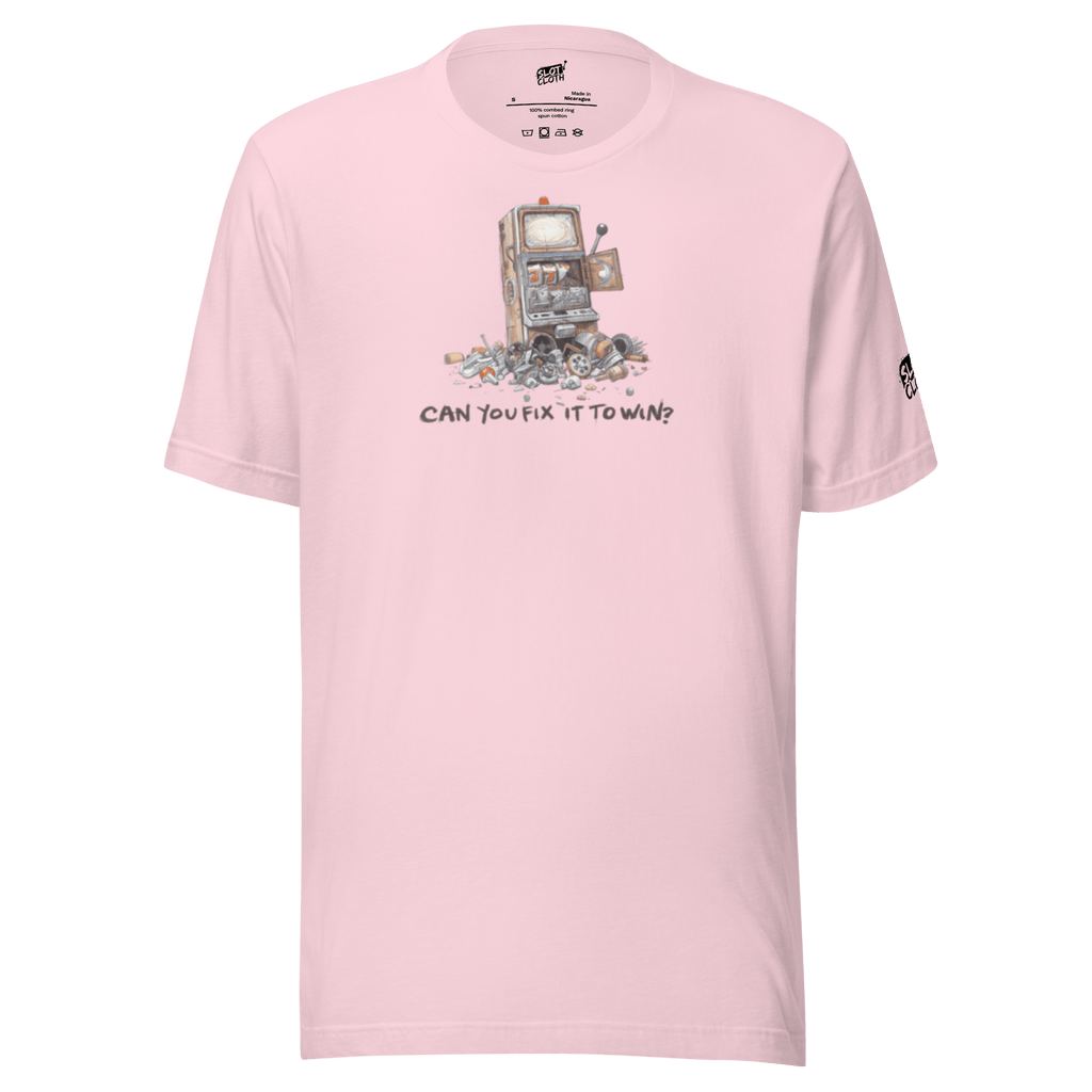 Pink t-shirt with broken slot machine graphic and text 'CAN YOU FIX IT TO WIN?'