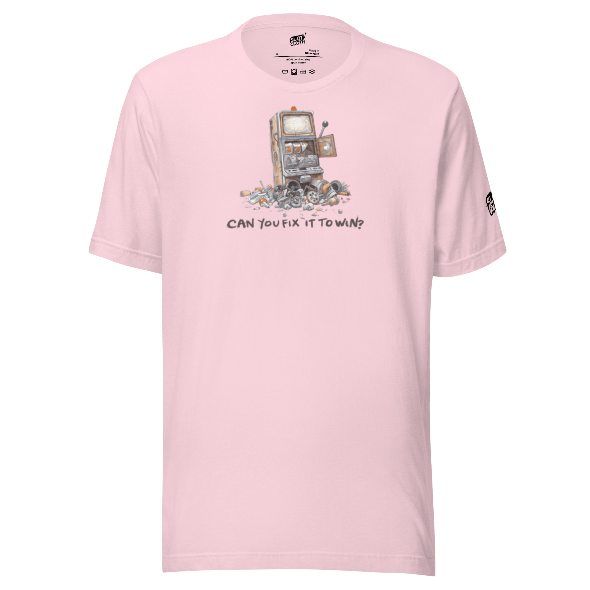 Pink t-shirt with broken slot machine graphic and text 'CAN YOU FIX IT TO WIN?'